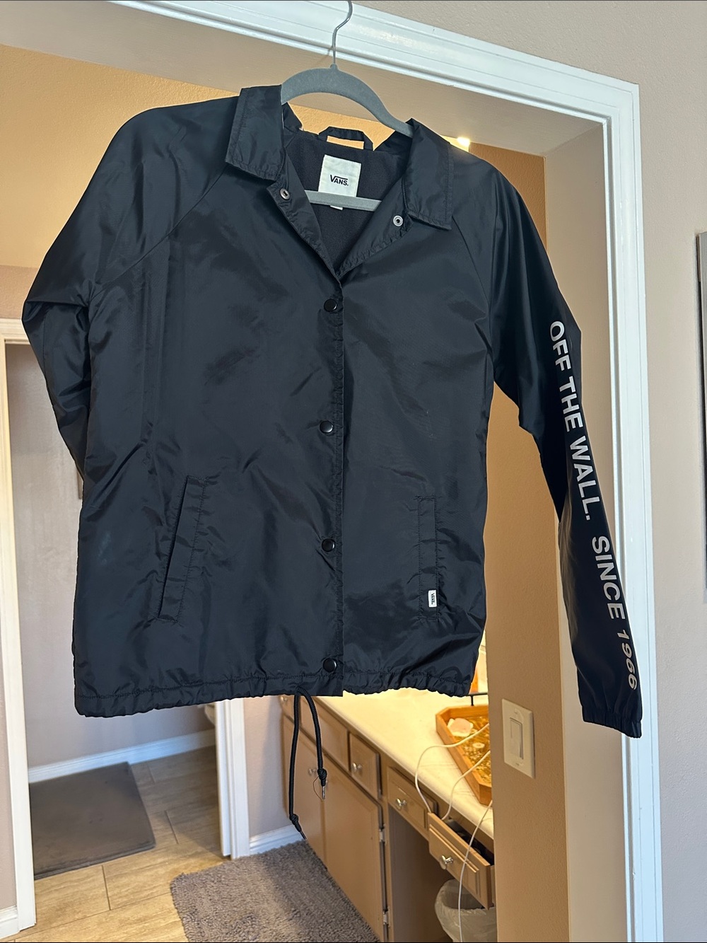 Vans Women’s Black Coach Jacket with Sleeve 'Off The Wall' Graphic